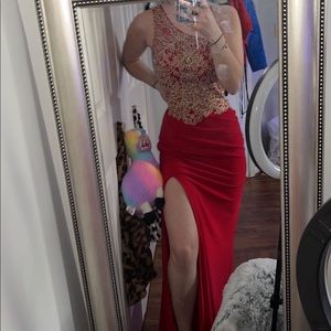 Red Prom Dress. New and worn ONCE. Tailored only a bit to hug areas. No flaws.